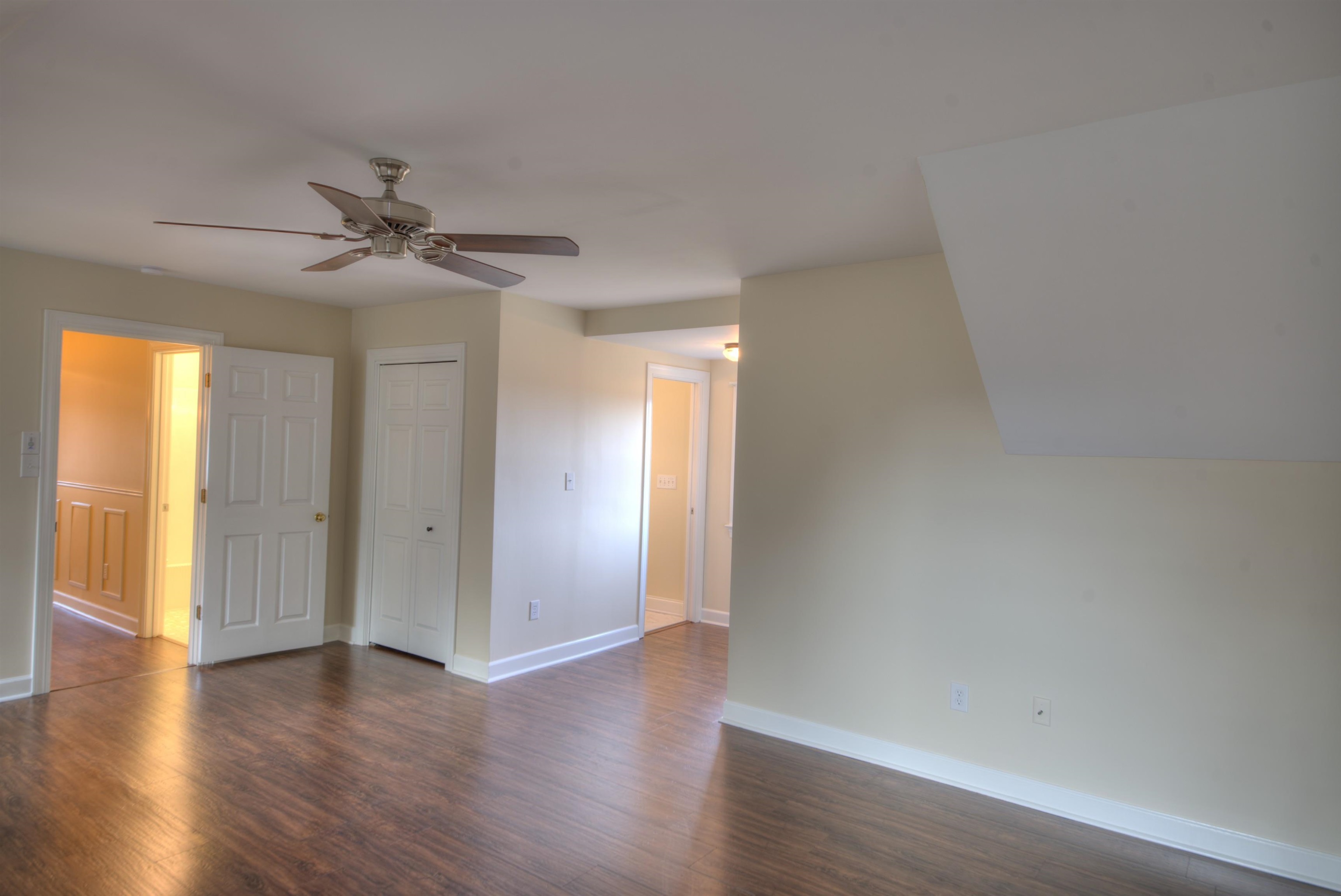 152 Huntington Place Waynesboro, VA 22980 - Photo 53 of 73 a view of an empty room with wooden floor and a window