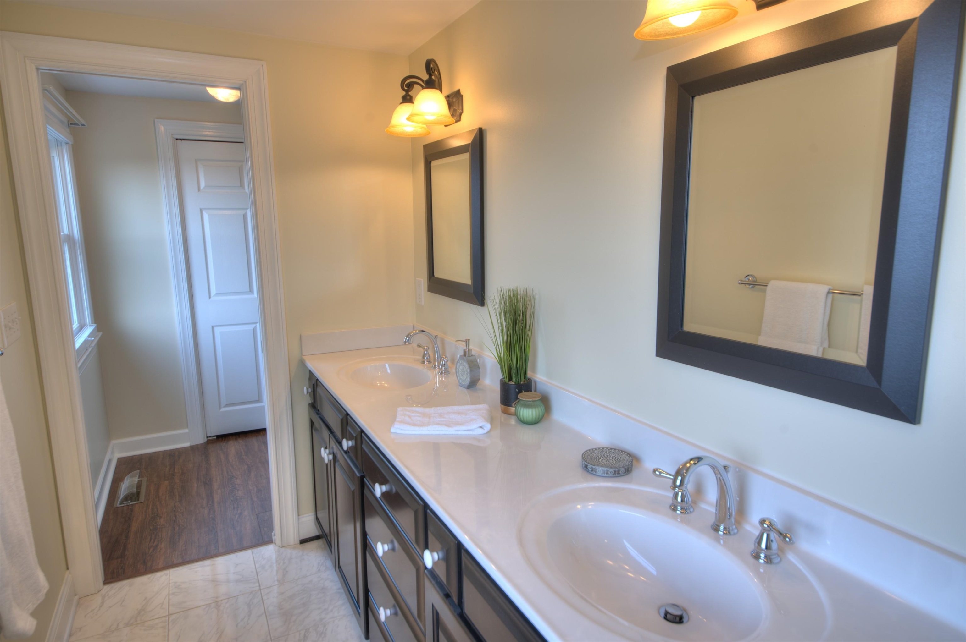 152 Huntington Place Waynesboro, VA 22980 - Photo 54 of 73 a bathroom with a double vanity sink and a mirror