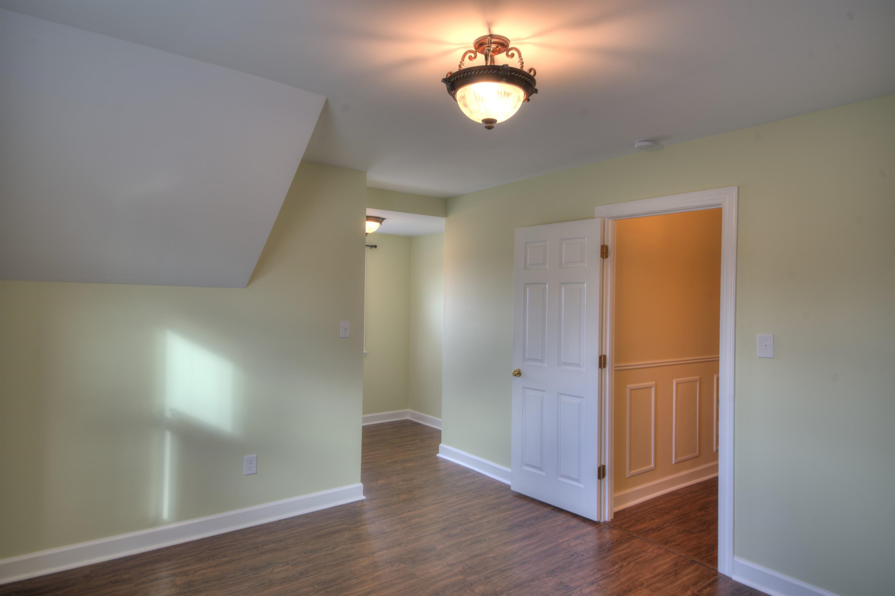 152 Huntington Place Waynesboro, VA 22980 - Photo 55 of 73 an empty room with wooden floor and windows