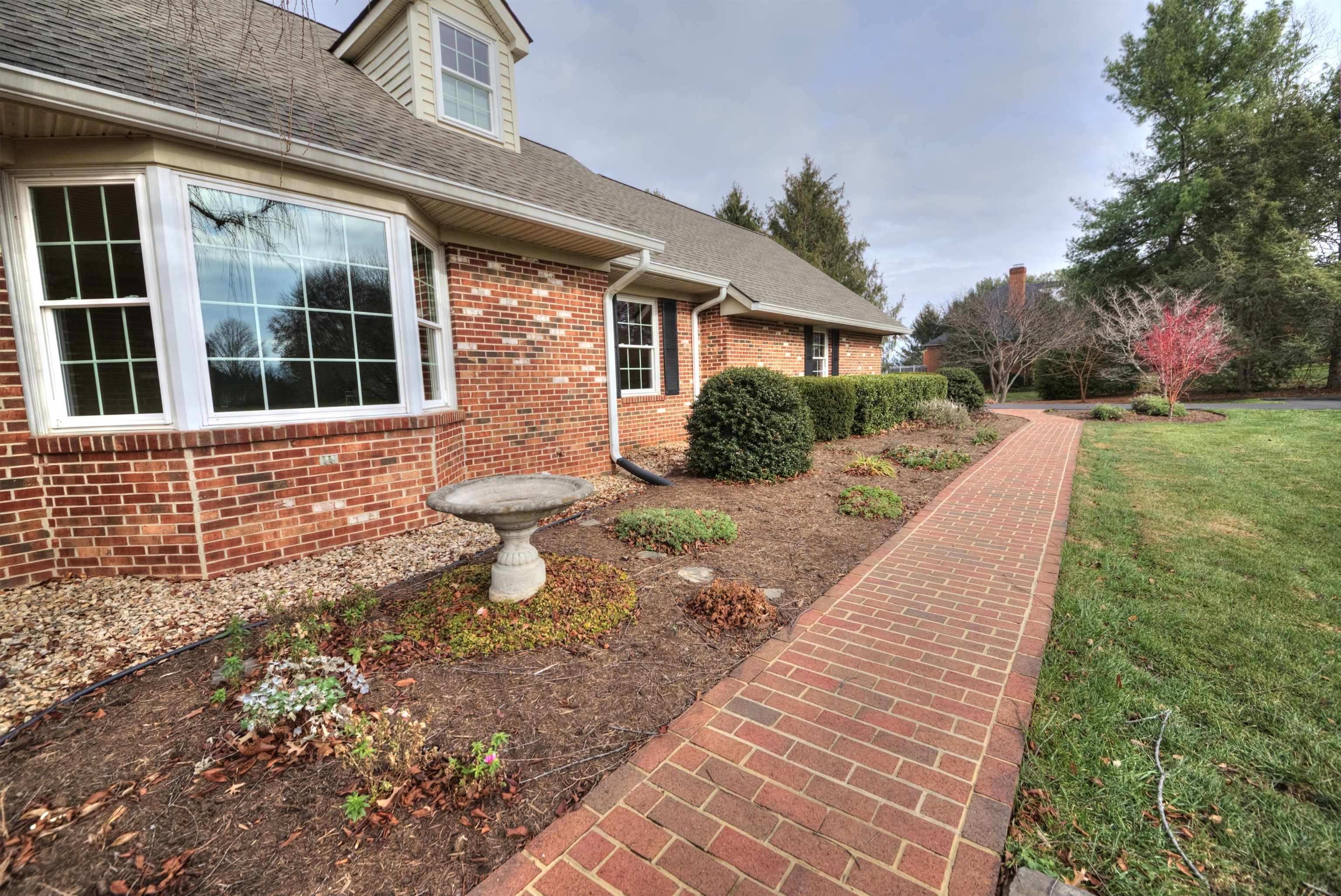 152 Huntington Place Waynesboro, VA 22980 - Photo 58 of 73 a view of a brick house with a yard