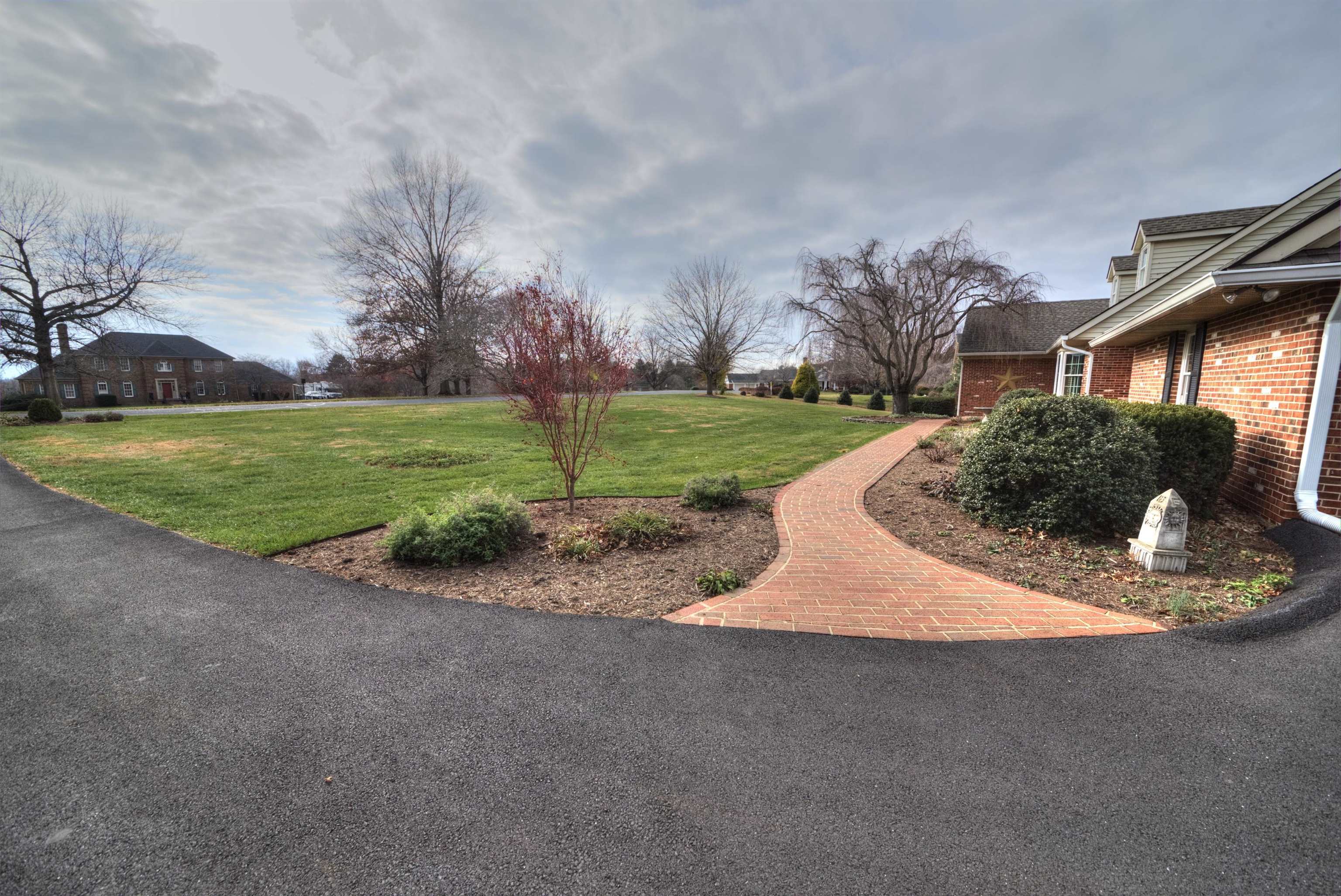 152 Huntington Place Waynesboro, VA 22980 - Photo 59 of 73 a view of a house with a yard and garage