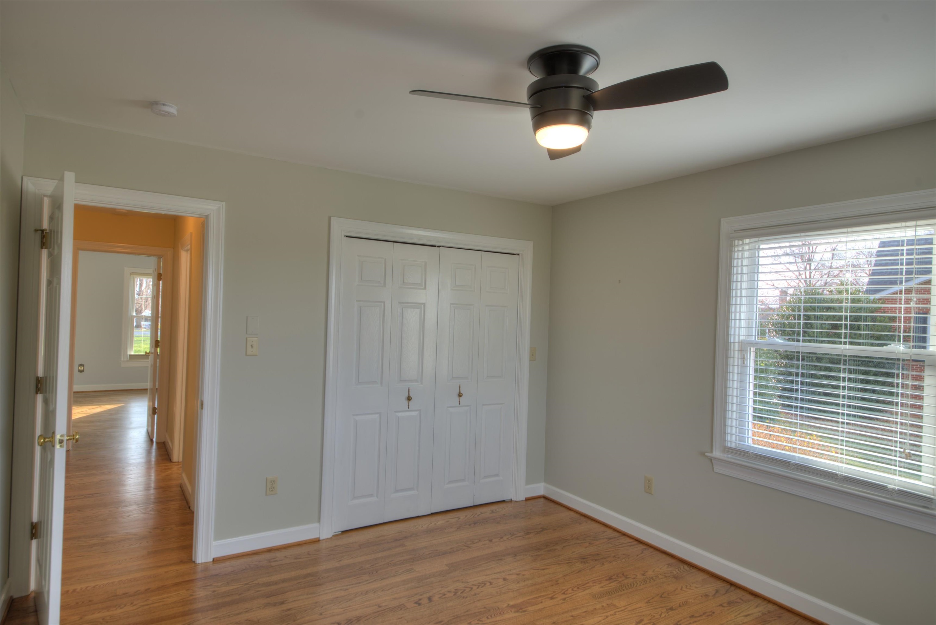 152 Huntington Place Waynesboro, VA 22980 - Photo 9 of 73 wooden floor in an empty room with a window