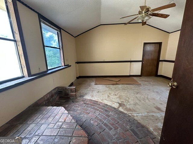 308 Three Rivers Lane Uvalda, GA 30473 - Photo 11 of 28 a bedroom with a bed and a window