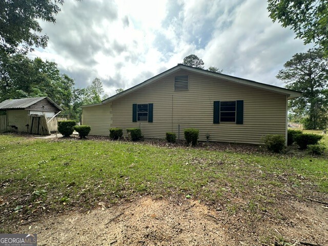 308 Three Rivers Lane Uvalda, GA 30473 - Photo 26 of 28 a house view with backyard space