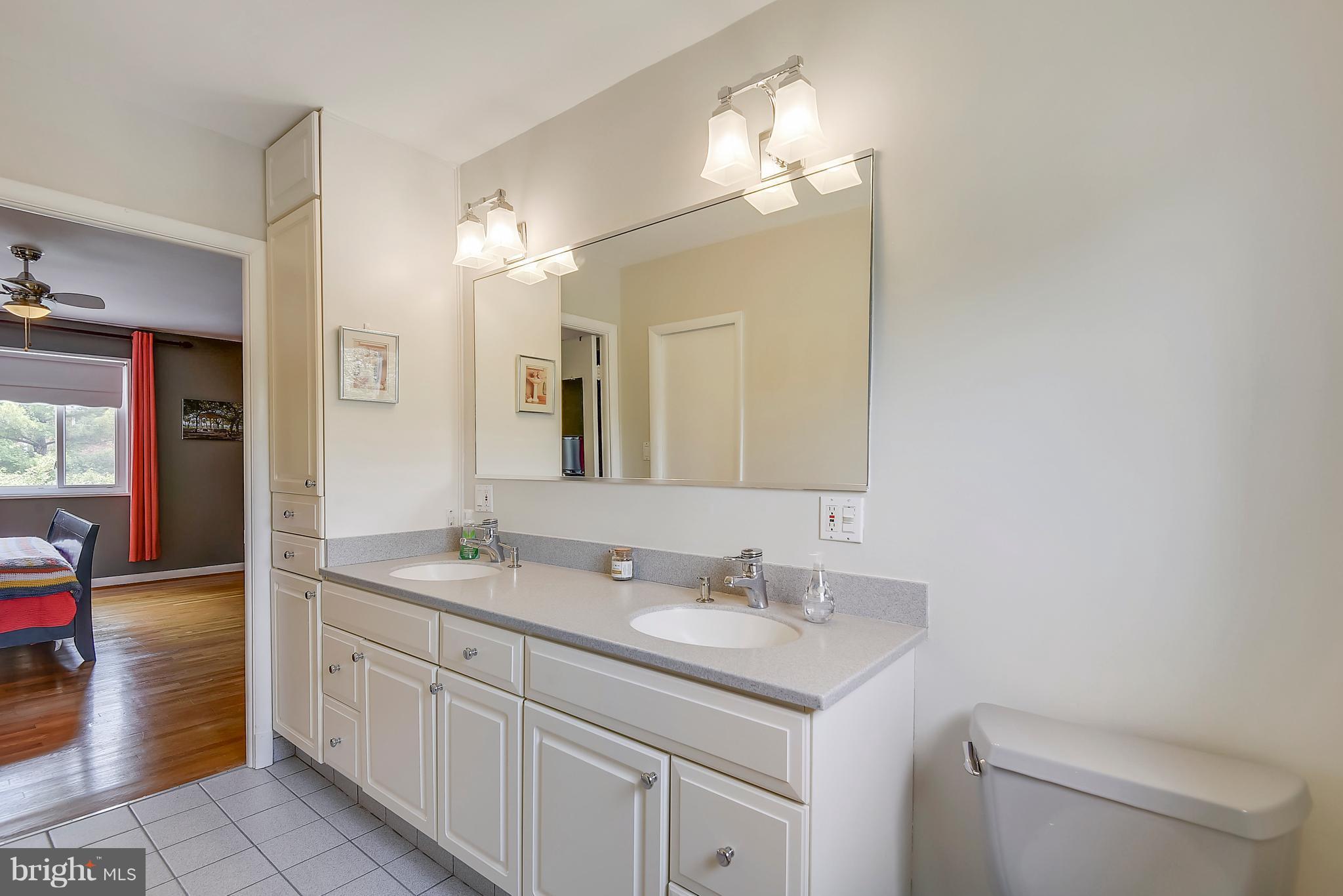 10000 Belhaven Road Bethesda, MD 20817 - Photo 17 of 30 REMODELED BATH W/DOUBLE BOWL CORIAN SINK