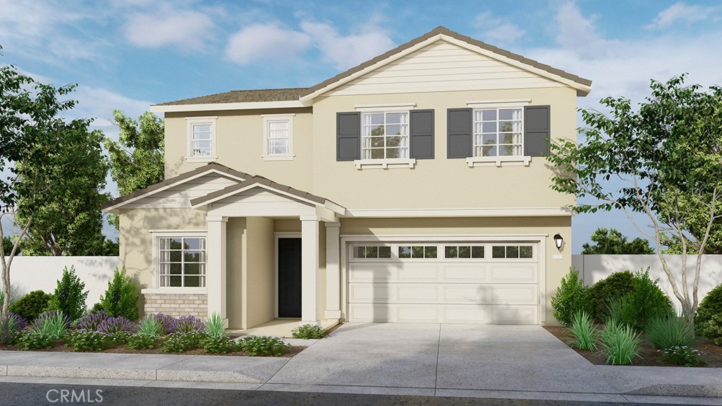 a view of a yard in front view of a house