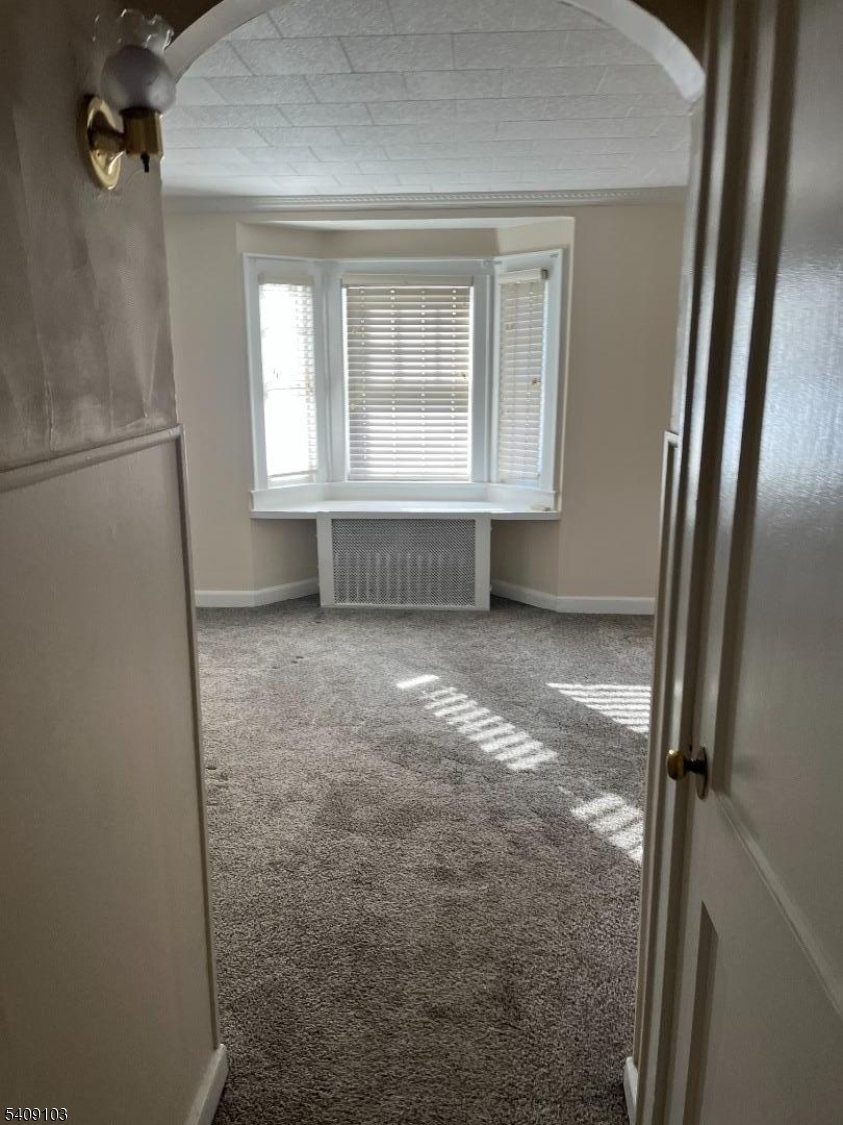136 East Main Street, Unit 1 Little Falls, NJ 07424 - Photo 7 of 11 a view of empty room with window