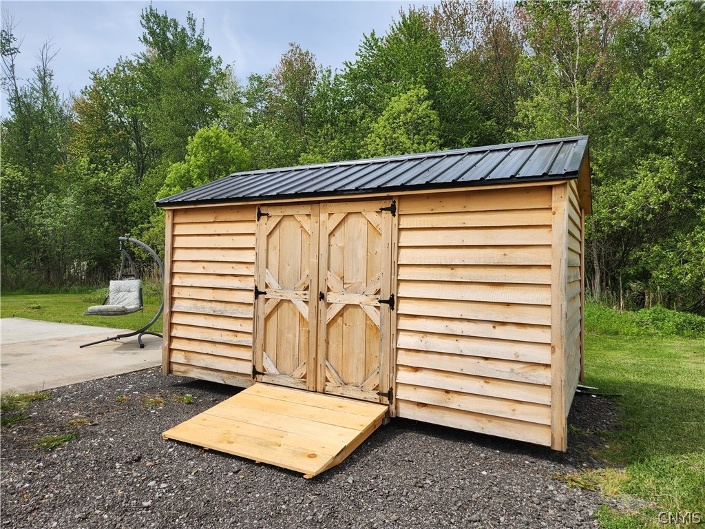 50 Barker Road Central Square, NY 13036 - Photo 27 of 31 Brand new, Amish built, 8' x 14' Shed with ramp and metal roof.