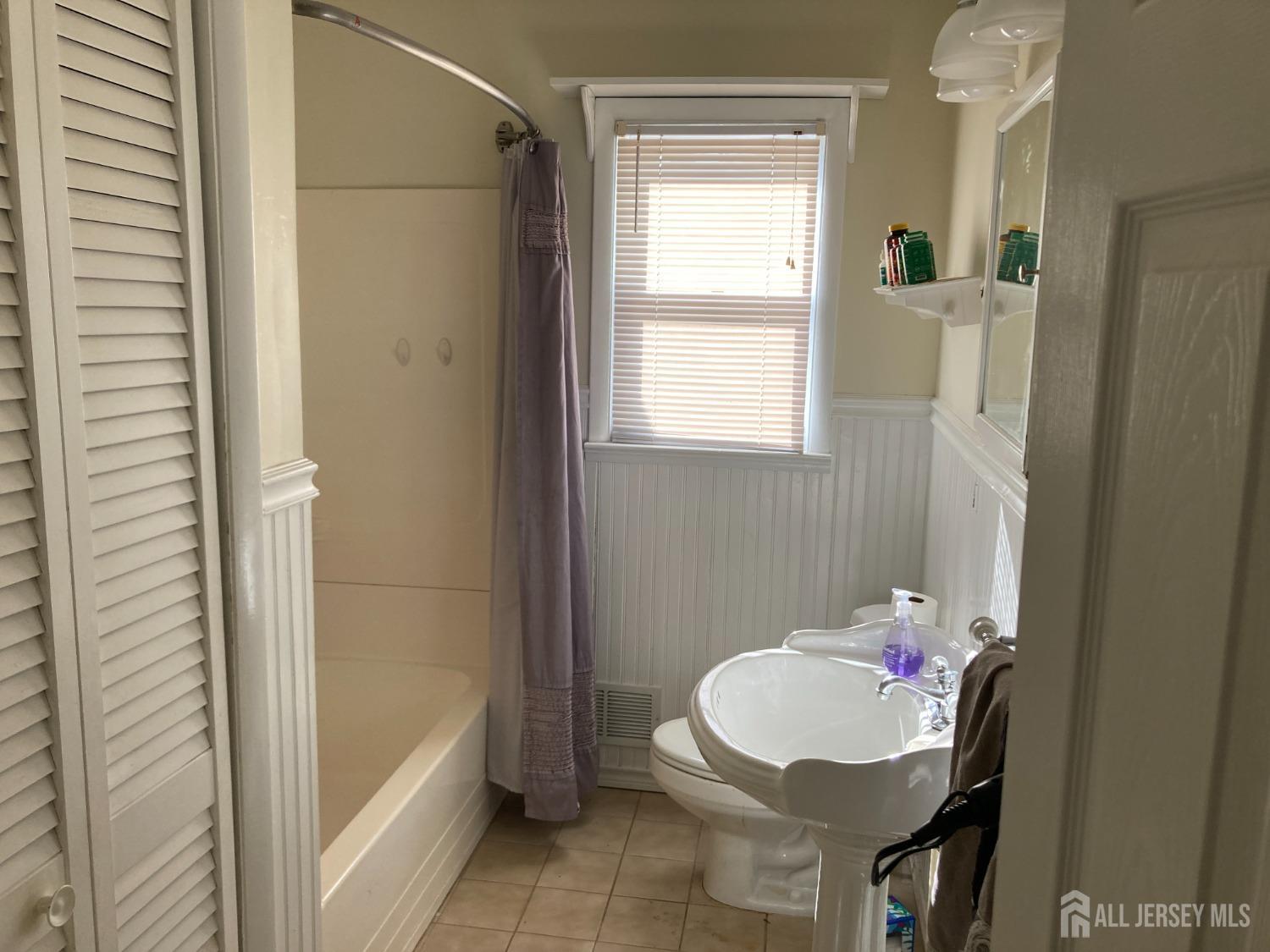 60 Edwards Road Brick, NJ 08723 - Photo 13 of 49 a bathroom with a sink a toilet and shower