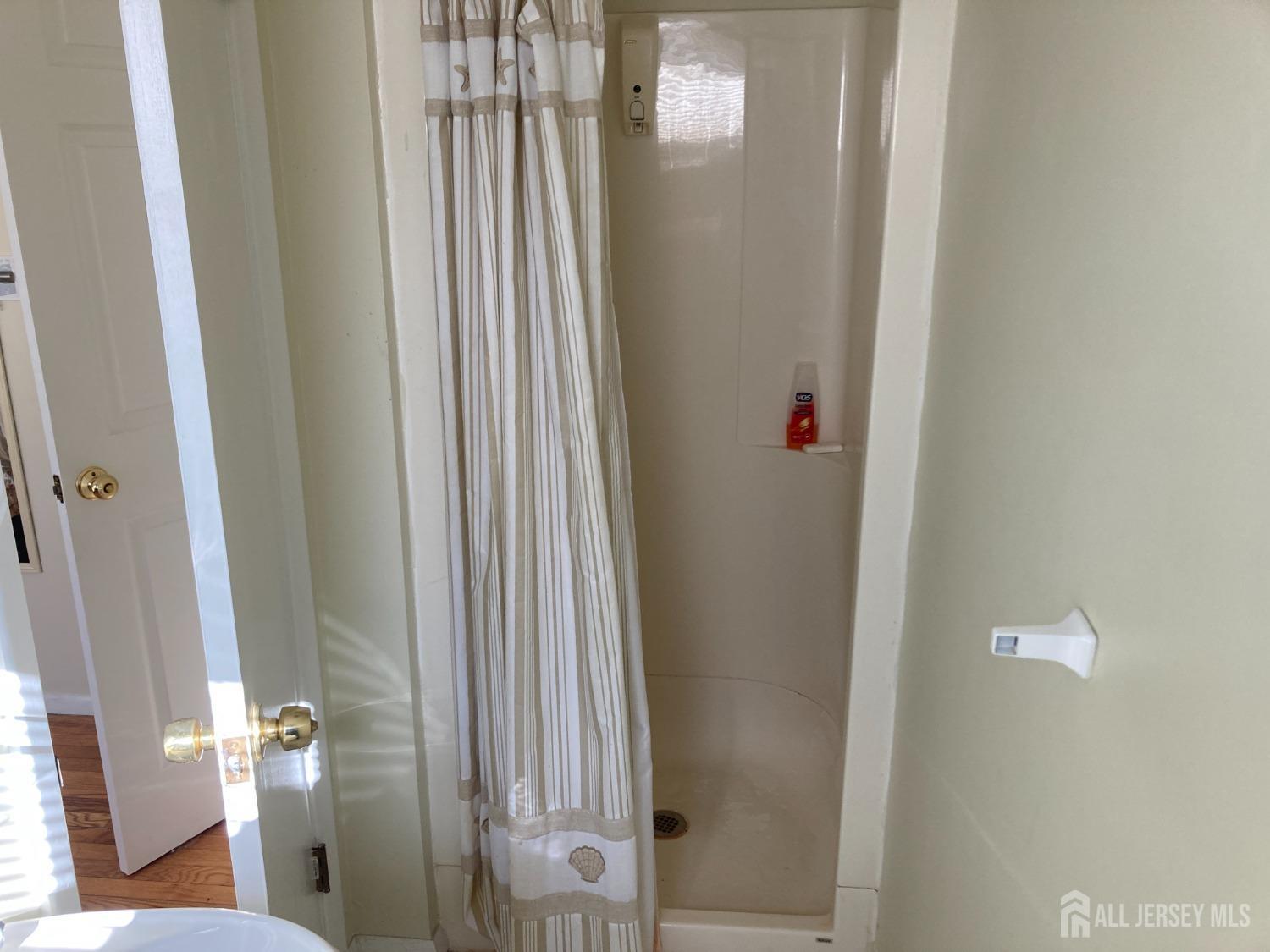 60 Edwards Road Brick, NJ 08723 - Photo 14 of 49 a bathroom with a shower