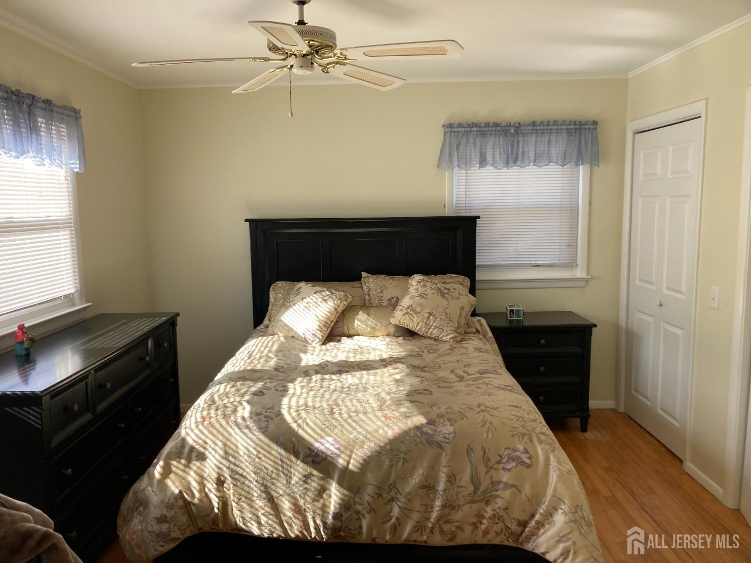 60 Edwards Road Brick, NJ 08723 - Photo 16 of 49 a bed sitting in a bedroom next to a window
