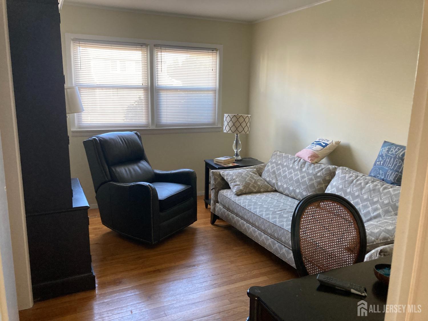 60 Edwards Road Brick, NJ 08723 - Photo 18 of 49 a living room with furniture and a window