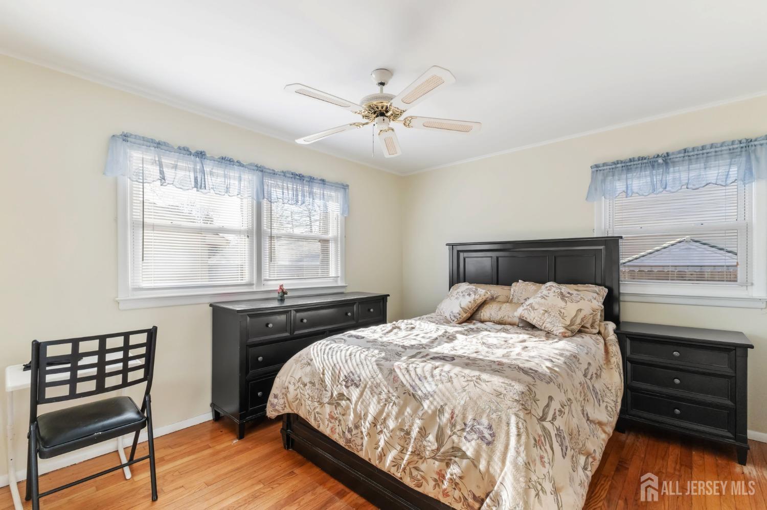 60 Edwards Road Brick, NJ 08723 - Photo 20 of 49 a bedroom with a bed and wooden floor