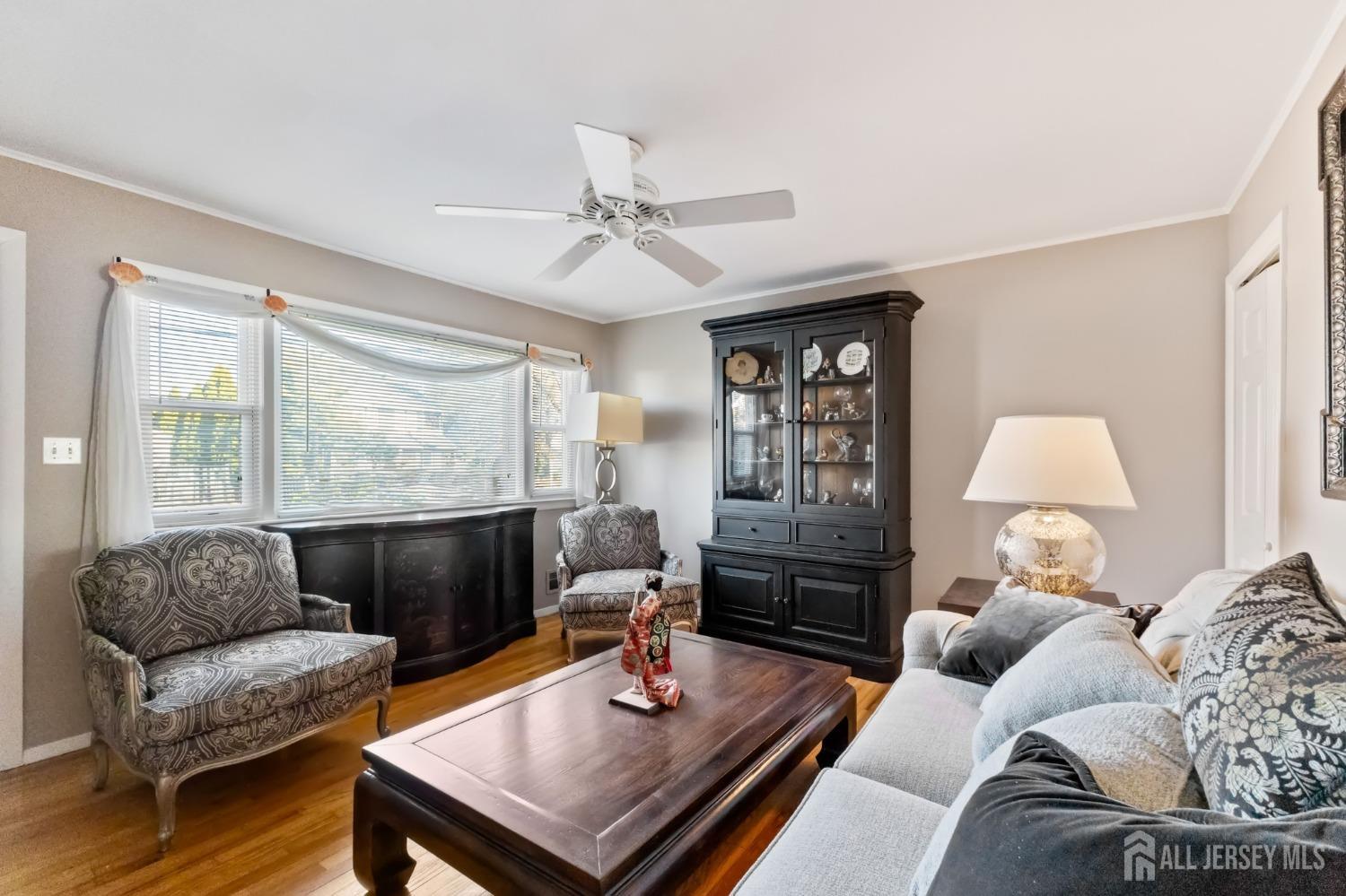60 Edwards Road Brick, NJ 08723 - Photo 28 of 49 a living room with furniture and a large window