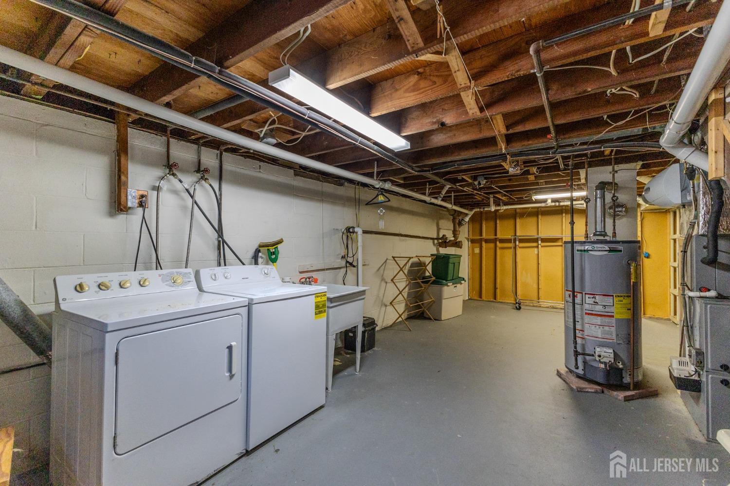 60 Edwards Road Brick, NJ 08723 - Photo 32 of 49 a utility room with dryer and washer