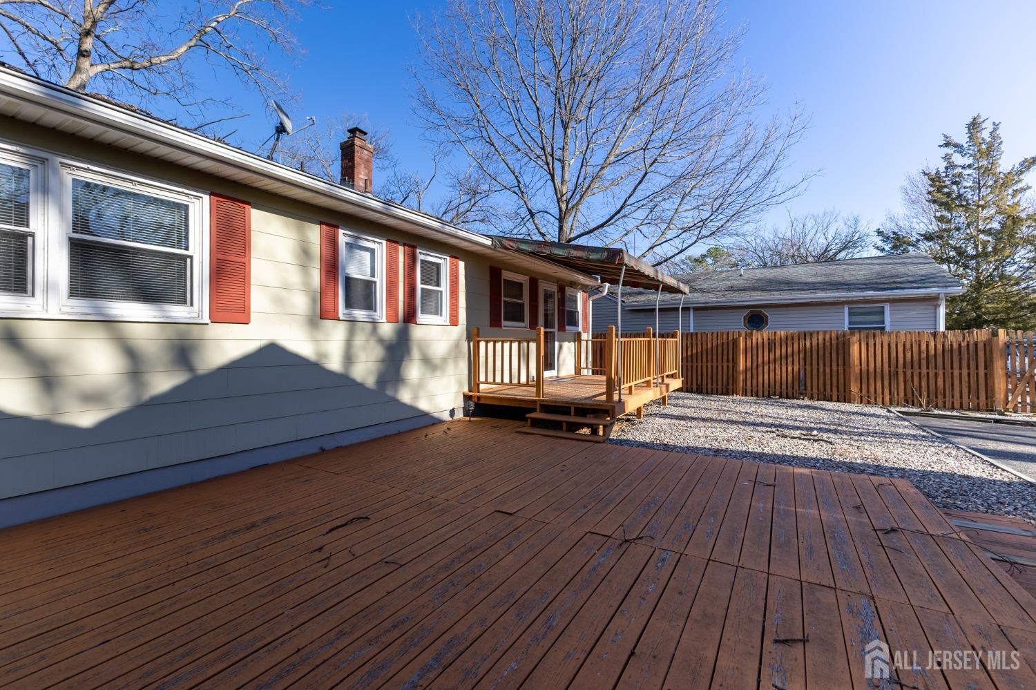 60 Edwards Road Brick, NJ 08723 - Photo 33 of 49 a view of a house with backyard and sitting area