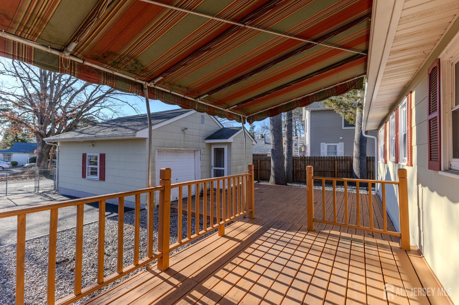 60 Edwards Road Brick, NJ 08723 - Photo 37 of 49 a view of a house with wooden deck