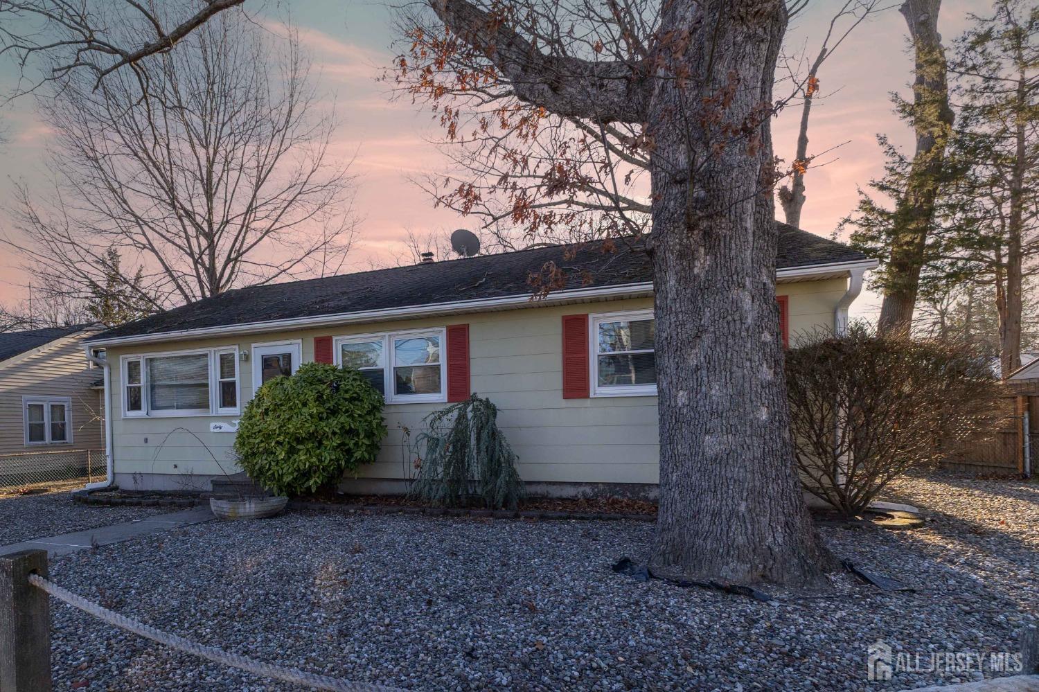 60 Edwards Road Brick, NJ 08723 - Photo 40 of 49 a view of a house with a yard and large tree