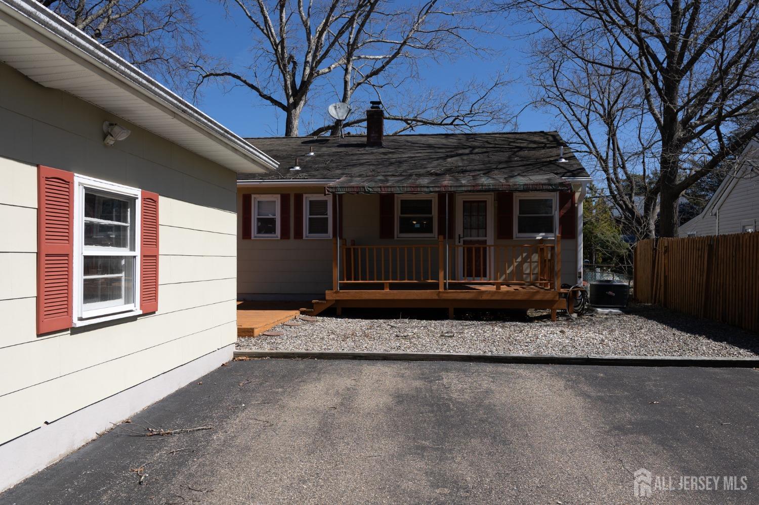 60 Edwards Road Brick, NJ 08723 - Photo 43 of 49 a front view of a house with a yard
