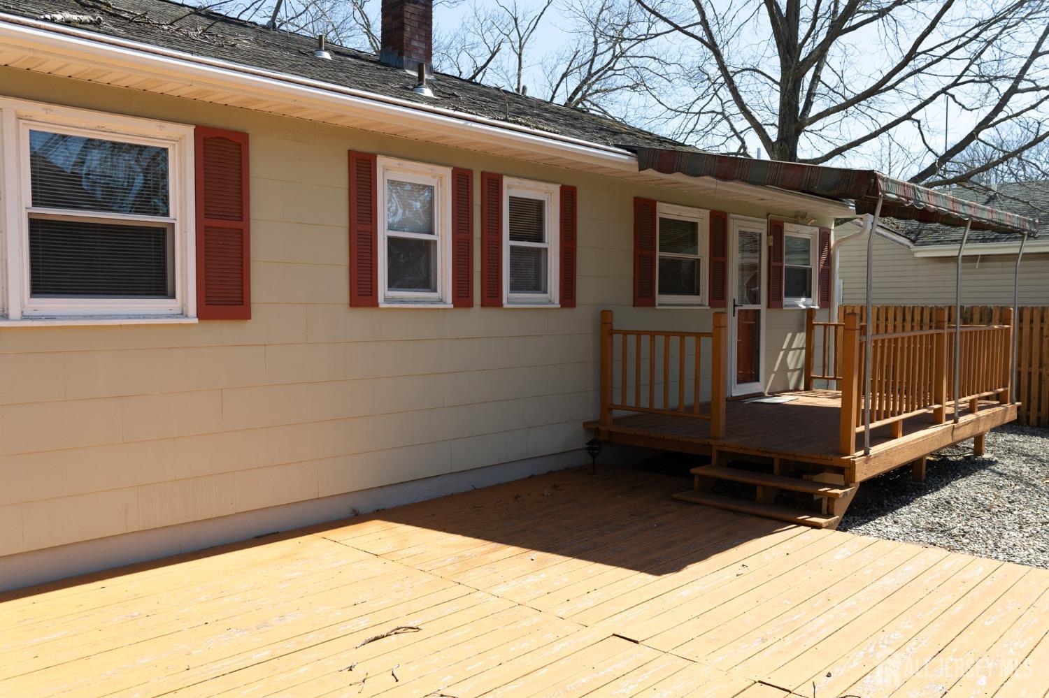 60 Edwards Road Brick, NJ 08723 - Photo 44 of 49 a view of a house with a wooden deck