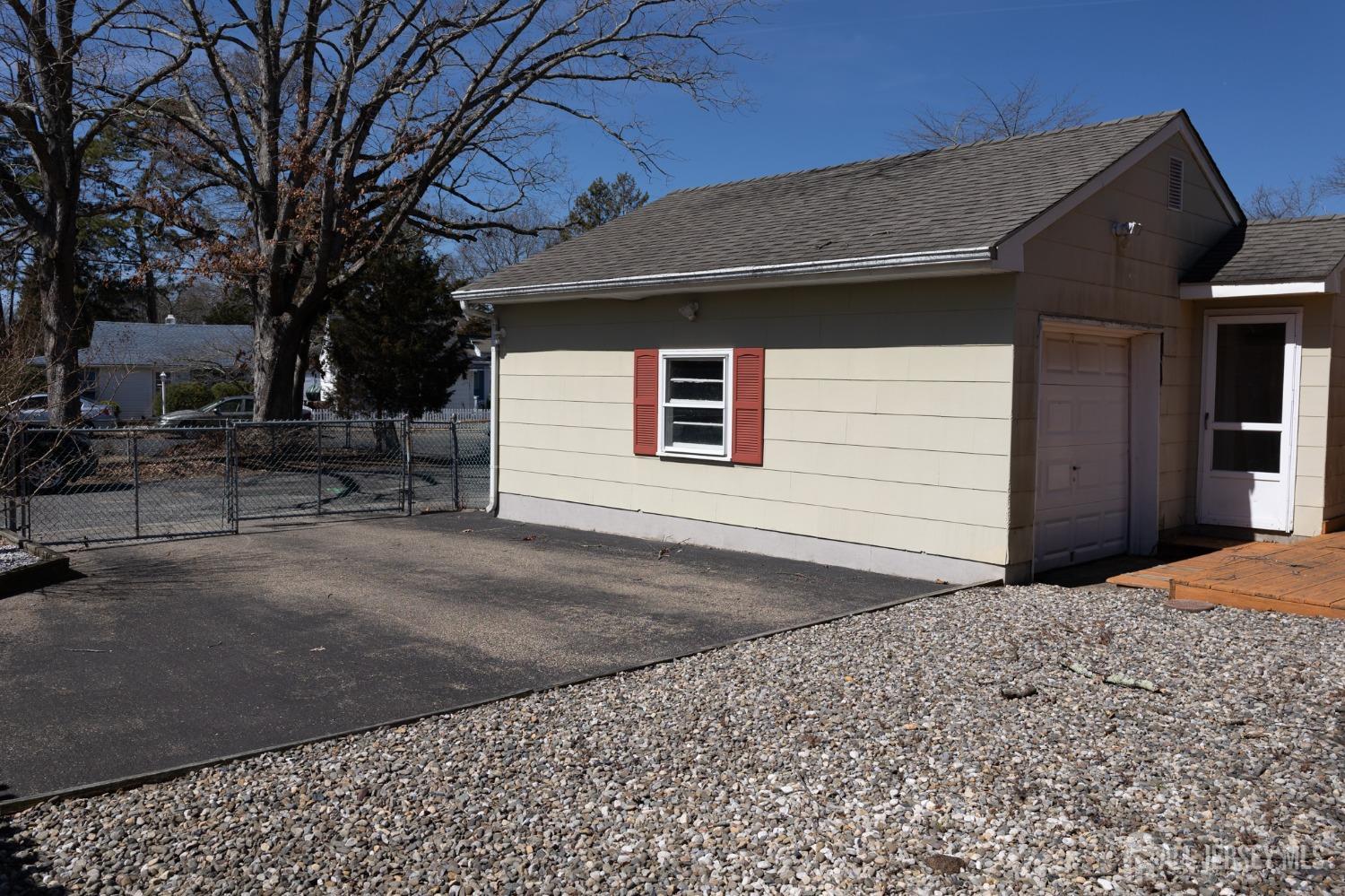 60 Edwards Road Brick, NJ 08723 - Photo 45 of 49 a front view of a house with a yard