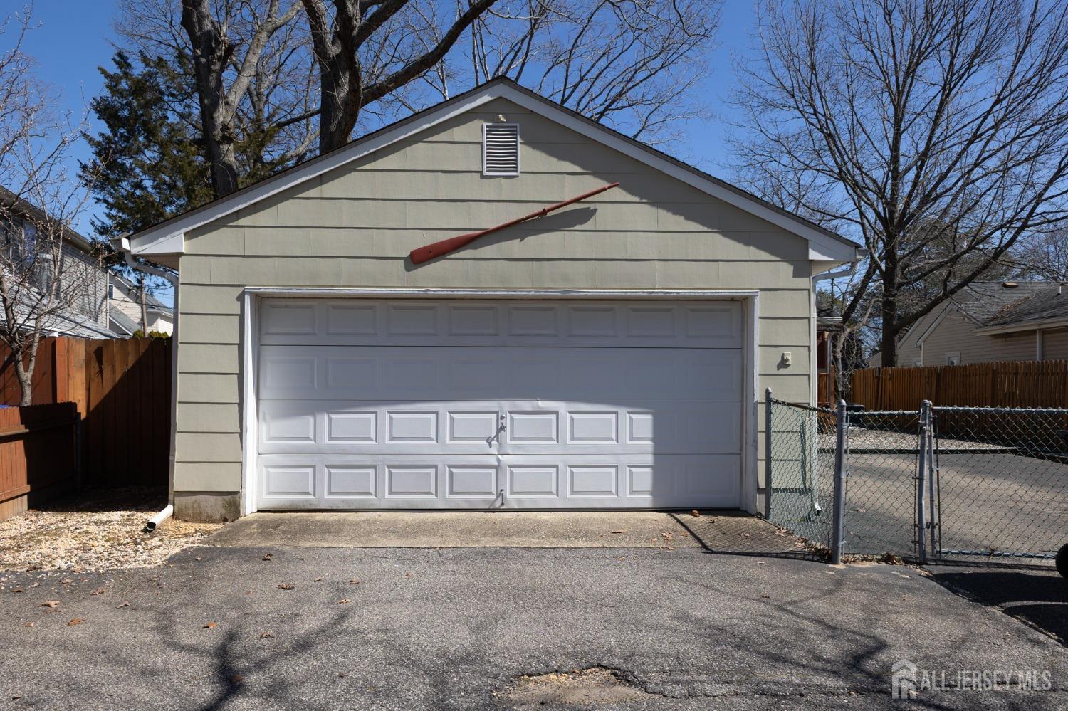 60 Edwards Road Brick, NJ 08723 - Photo 47 of 49 a front view of a house with a garage