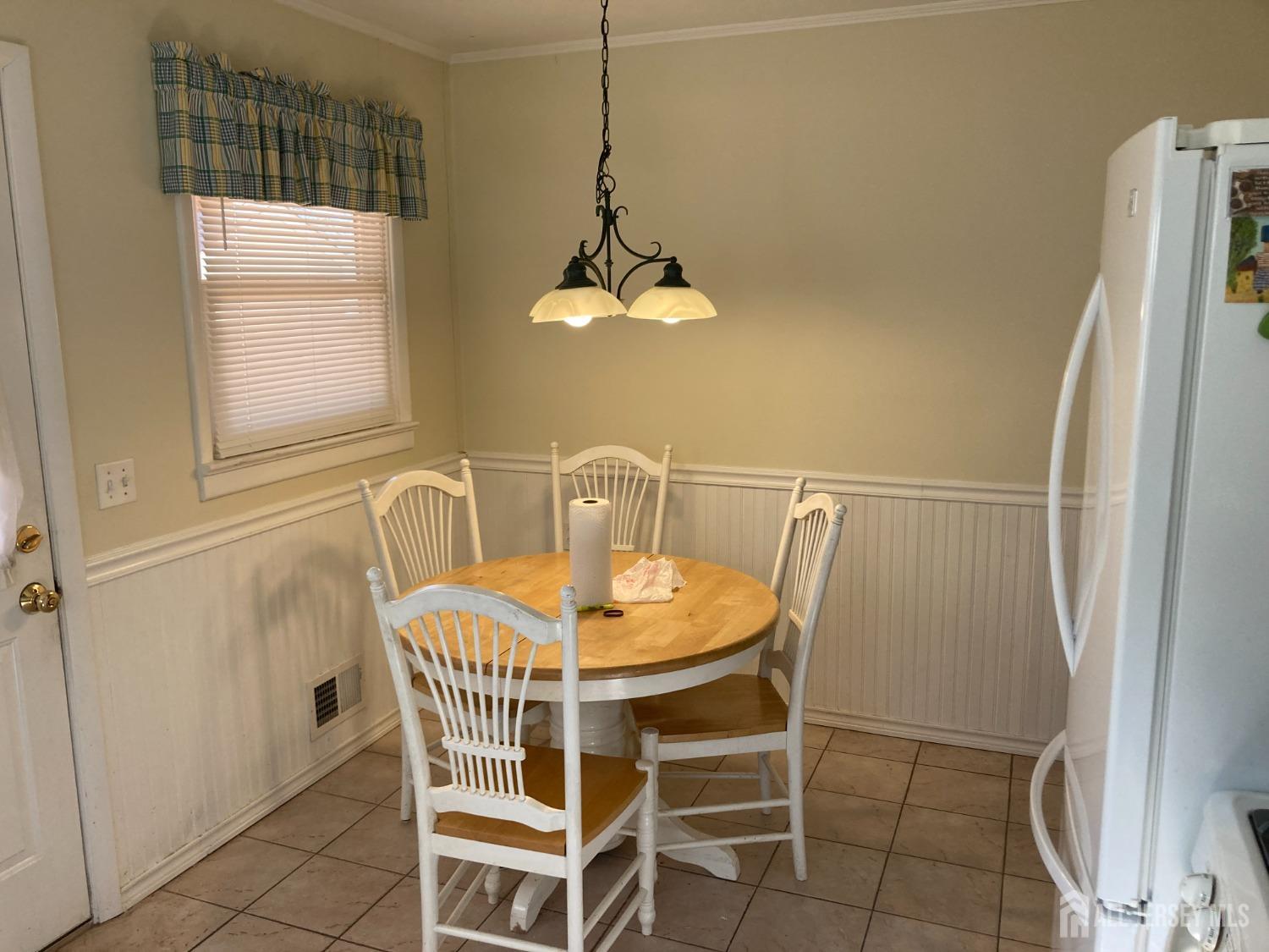 60 Edwards Road Brick, NJ 08723 - Photo 6 of 49 a dining room with furniture and window