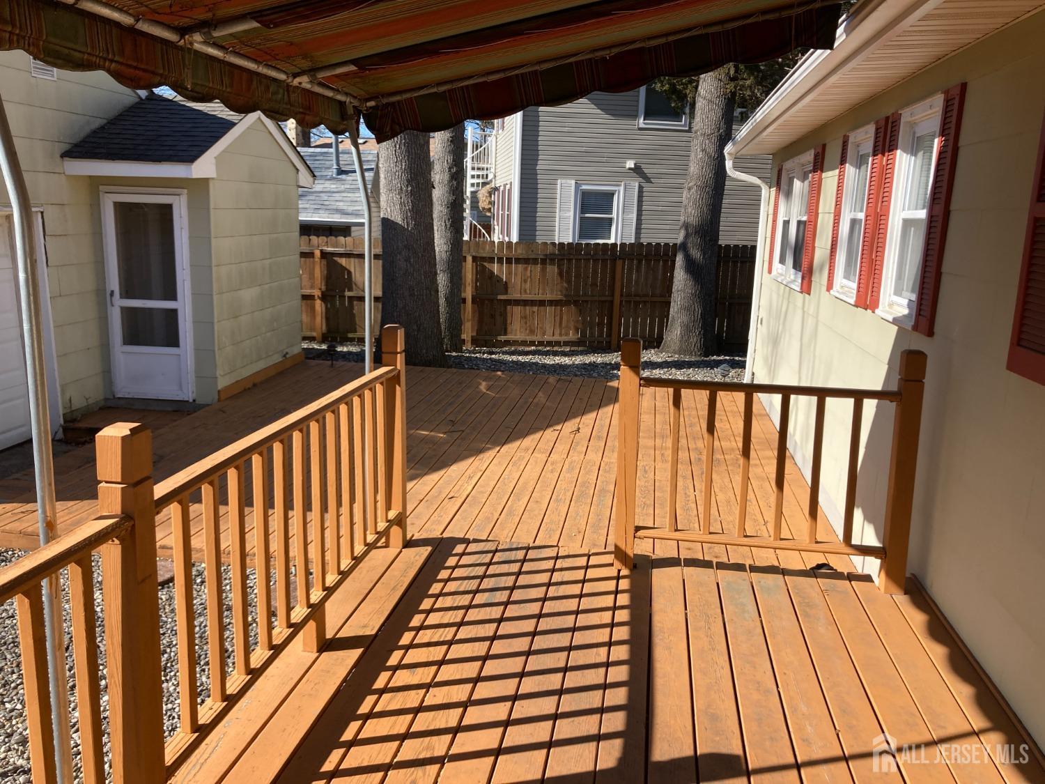60 Edwards Road Brick, NJ 08723 - Photo 7 of 49 a view of balcony with wooden floor