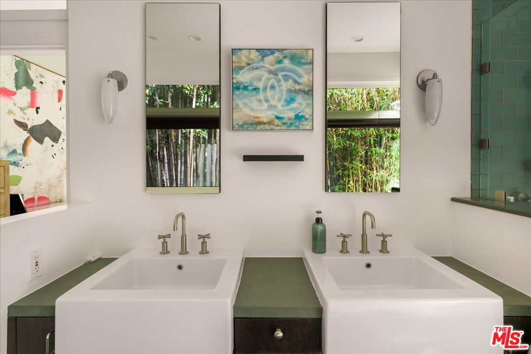 3479 Mandeville Canyon Road Los Angeles, CA 90049 - Photo 29 of 55 a bathroom with a sink and a window