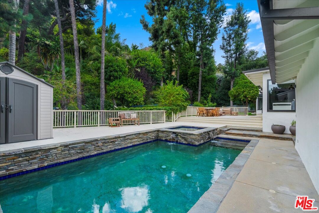 3479 Mandeville Canyon Road Los Angeles, CA 90049 - Photo 36 of 55 a outdoor view with a sitting space
