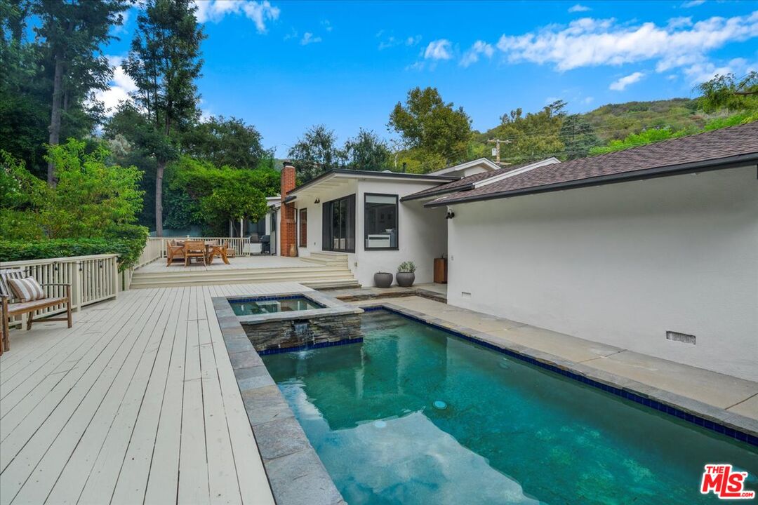 3479 Mandeville Canyon Road Los Angeles, CA 90049 - Photo 38 of 55 a outdoor view with a seating space