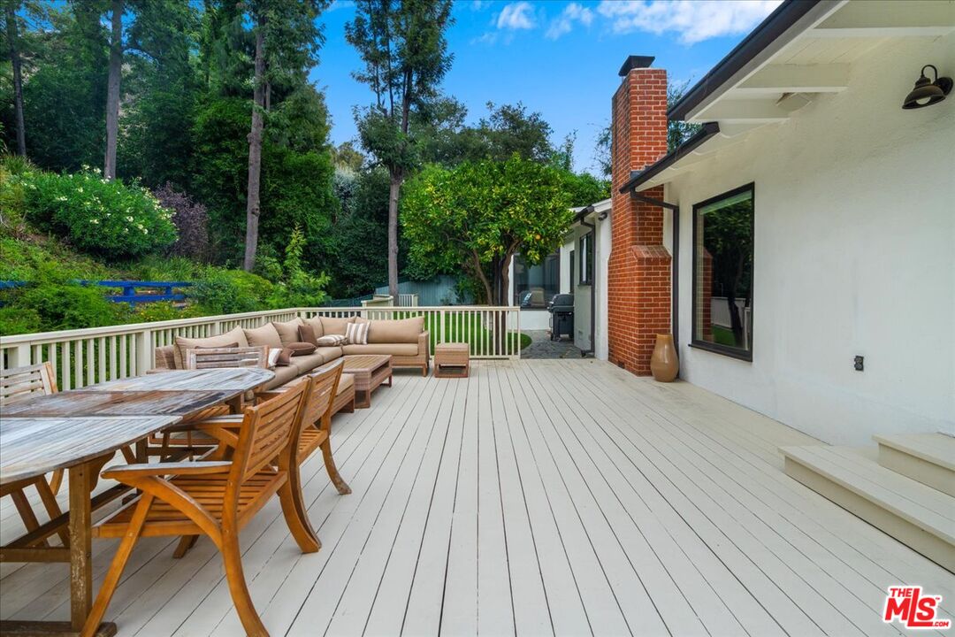 3479 Mandeville Canyon Road Los Angeles, CA 90049 - Photo 39 of 55 a view of deck with patio