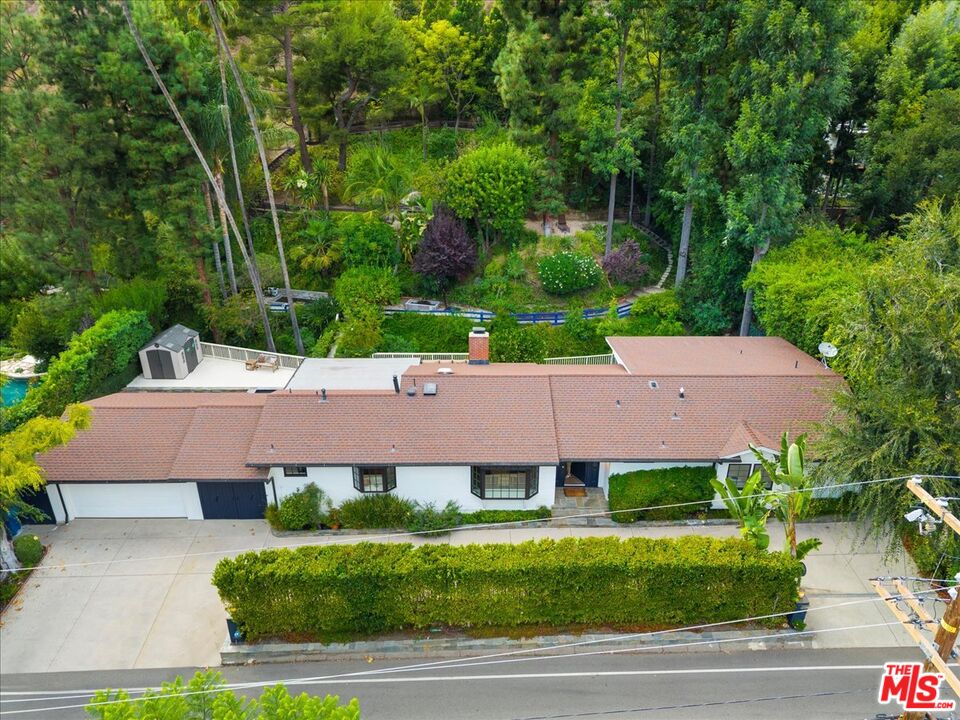 3479 Mandeville Canyon Road Los Angeles, CA 90049 - Photo 52 of 55 an aerial view of a house