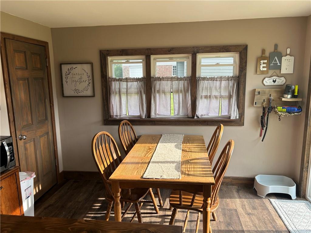 114 Howes Run Road Sarver, PA 16055 - Photo 14 of 33 a view of a dining room with furniture window and wooden floor