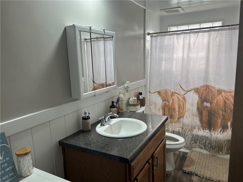 114 Howes Run Road Sarver, PA 16055 - Photo 19 of 33 a bathroom with a granite countertop sink and a mirror
