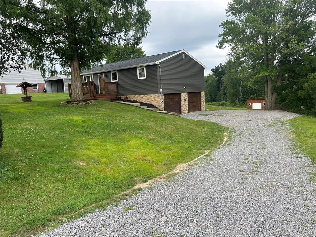 114 Howes Run Road Sarver, PA 16055 - Photo 4 of 33 a front view of house with yard and green space