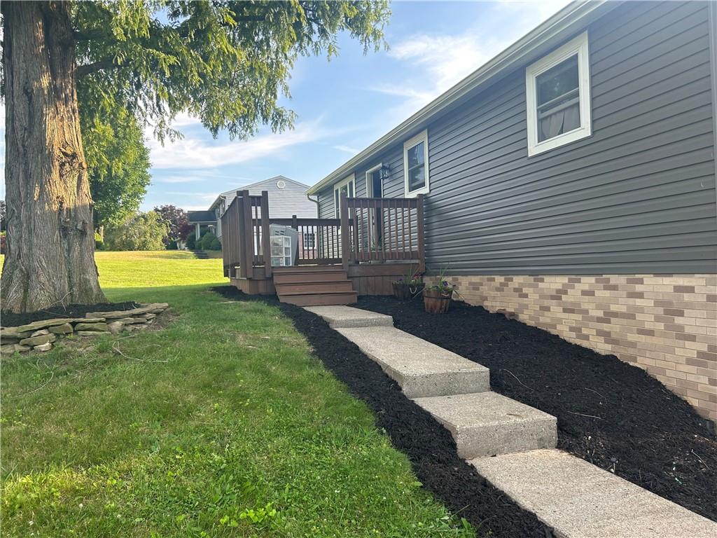 114 Howes Run Road Sarver, PA 16055 - Photo 5 of 33 a view of a house with a yard and a garden