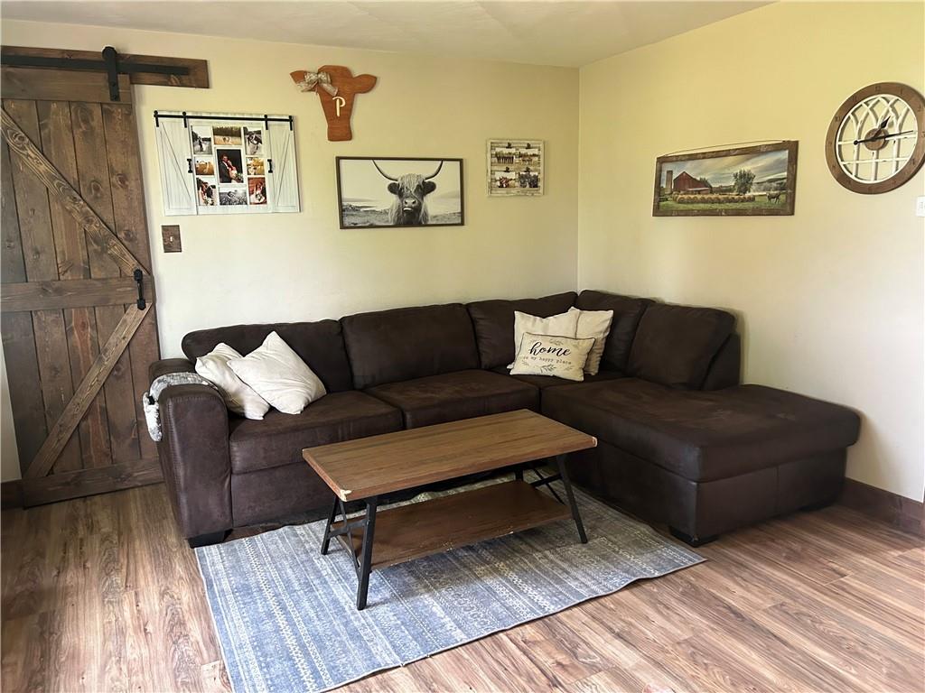 114 Howes Run Road Sarver, PA 16055 - Photo 9 of 33 a living room with furniture and a wooden floor