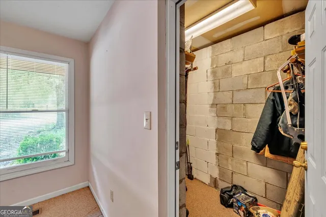 a bathroom with a sink mirror and vanity