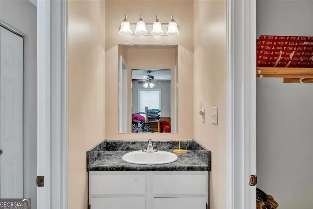 a balcony with wooden floor and wooden fence