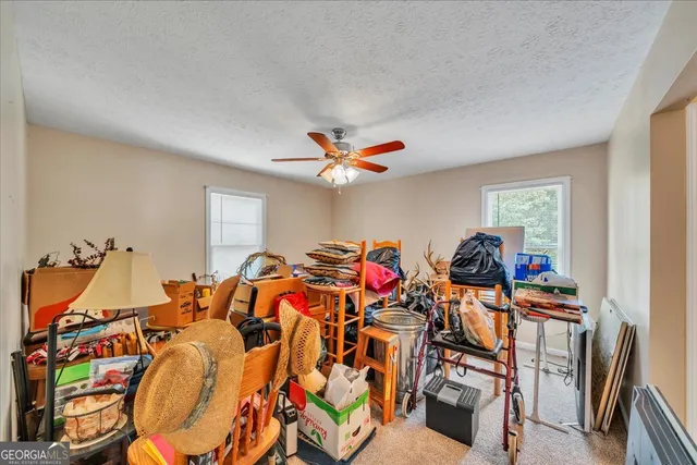 a view of a balcony with wooden floor