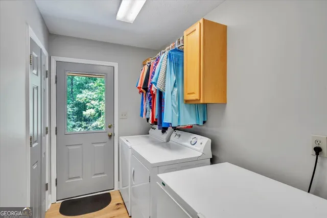 a living room with furniture and windows