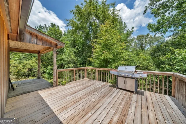 a view of a lake with a yard