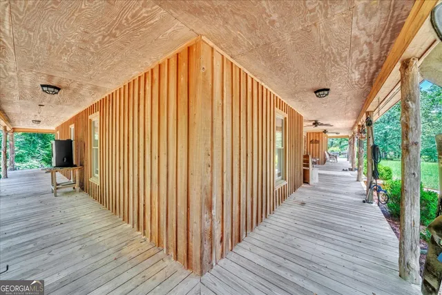 a view of a swimming pool with a yard