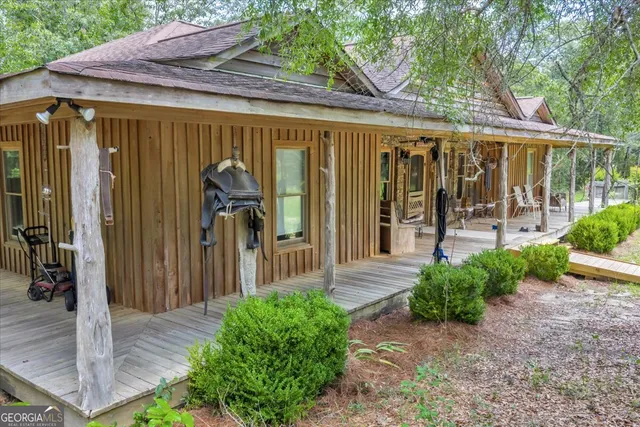 a view of a yard with a swimming pool