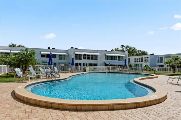 an aerial view of a swimming pool