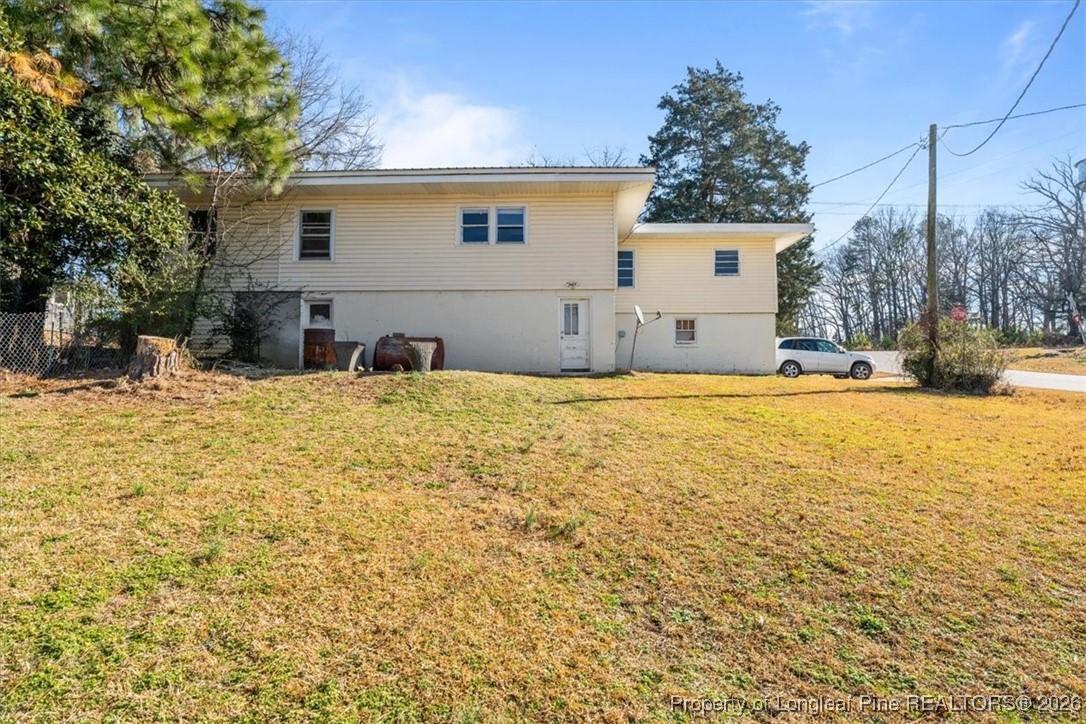 101 North Rockingham Street Robbins, NC 27325 - Photo 2 of 32 a view of a yard with a house
