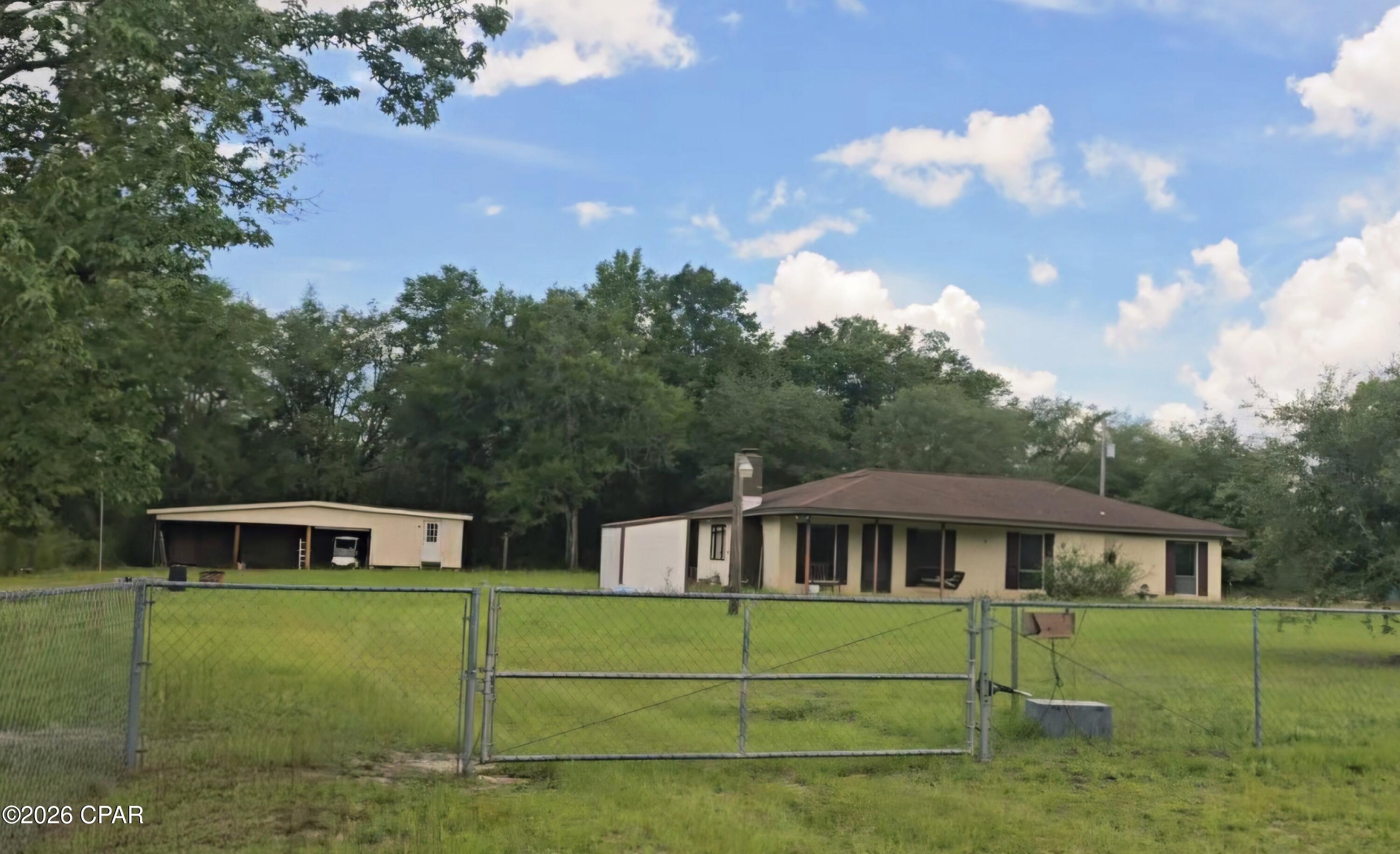 12835 Farm Road Southport, FL 32409 - Photo 1 of 13