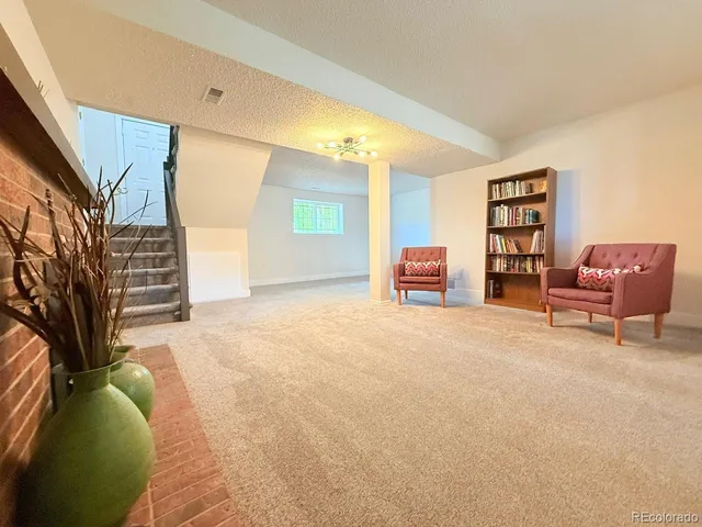 a bedroom with furniture and a bed