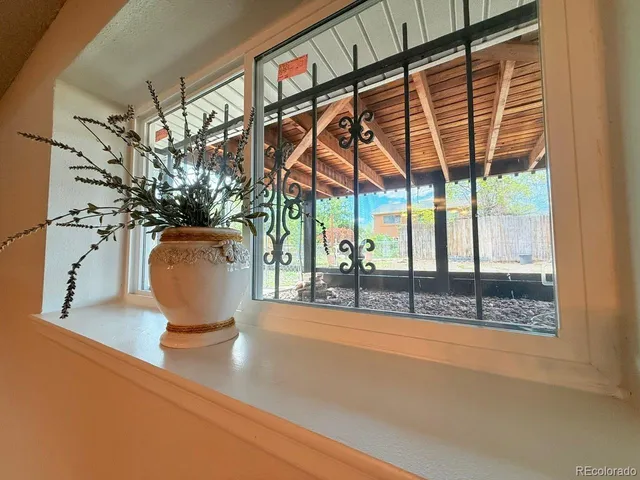 a view of an empty room with a fireplace